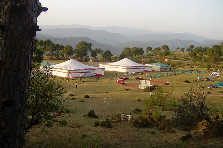 Event camp in the hills at sunset