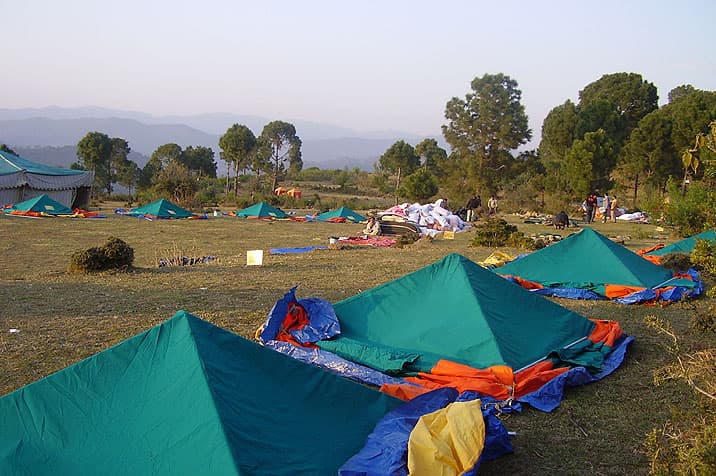 Trekking tents pitched at a mountain camp